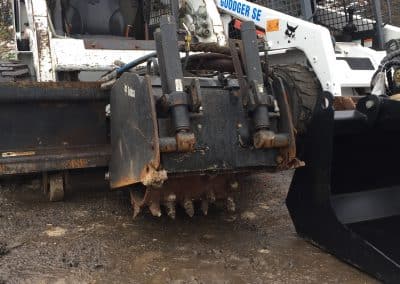 Skidsteer breaker attachment